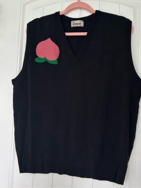 Peach sweater vest